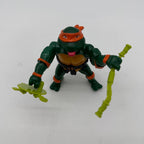 TMNT Rock N Roll Michaelangelo with weapons