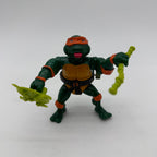 TMNT Rock N Roll Michaelangelo with weapons